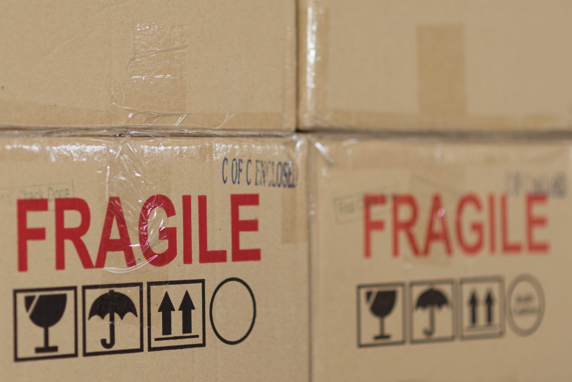 Brown cardboard boxes labeled "fragile"
