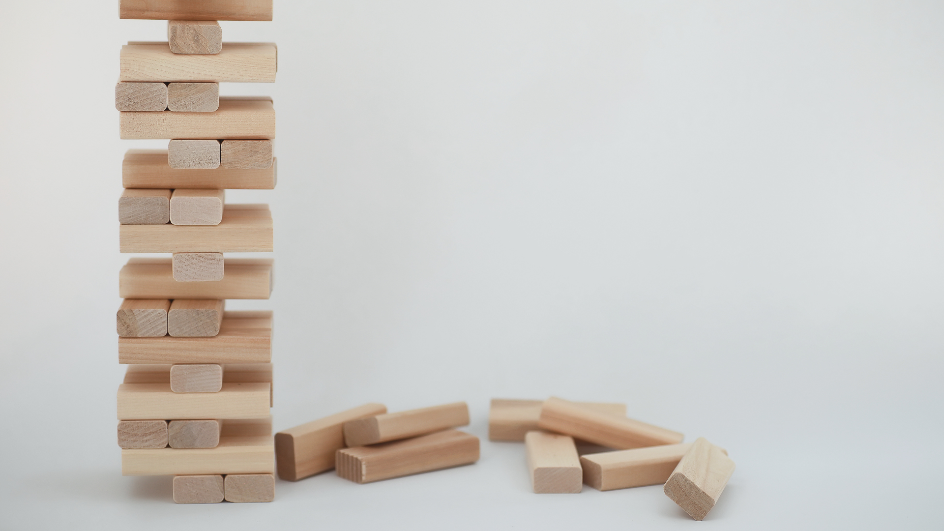 A Jenga tower with pieces removed